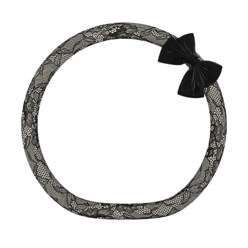 Onyx tweed lace steering wheel cover with black bow knot, D shape flat bottom, alternate angle